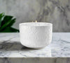 1986 luxury candle by Elia Parfum styled in home setting